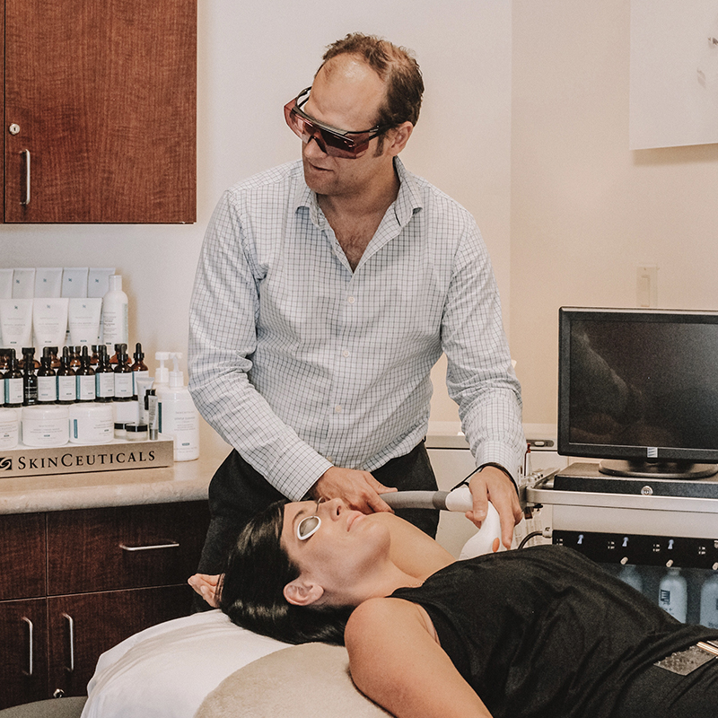 Female patient receiving laser hair removal