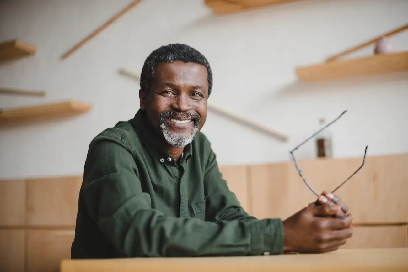 smiling older black man with glasses smiling older black man with glasses